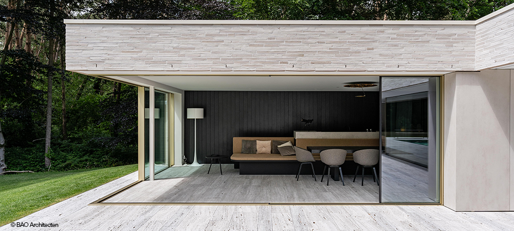 Moderne aanbouw met open hoek schuifraam Reynaers Aluminium