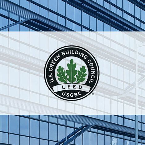 LEED logo in front of glass façade.