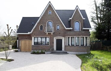 MasterPatio Coulissants, MasterLine 8 Fenêtres, MasterLine 8 Portes, MasterLine 8 HI Fenêtres et MasterLine 8-HI Portes - Rénovation totale d’une imposante maison d’architecte situé à Dendermonde, Belgique